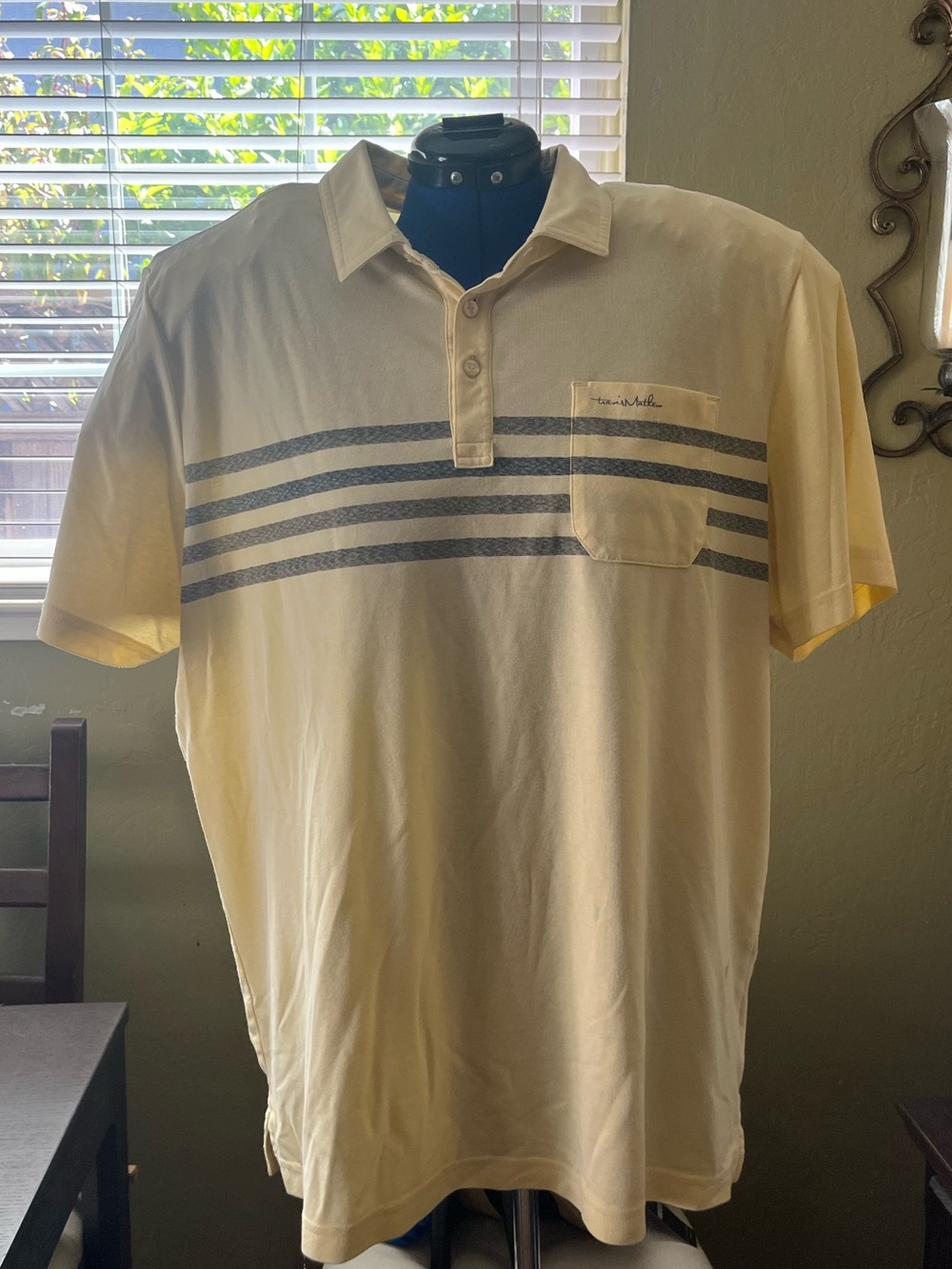 Travis Mathew Butter Yellow Polo with Gray Stripes and Chest Pocket